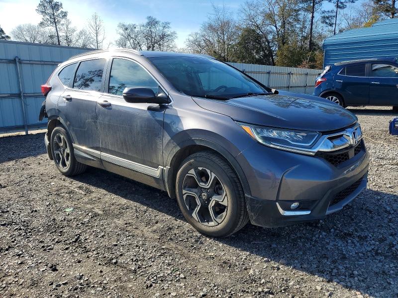 Photo 4 from auction – 2019 HONDA CR-V with VIN 7FARW1H99KE005267