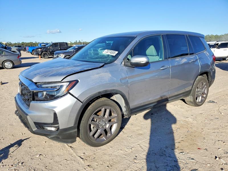 HONDA PASSPORT E 2023 with VIN 5FNYF8H58PB012814 - Photo from auction