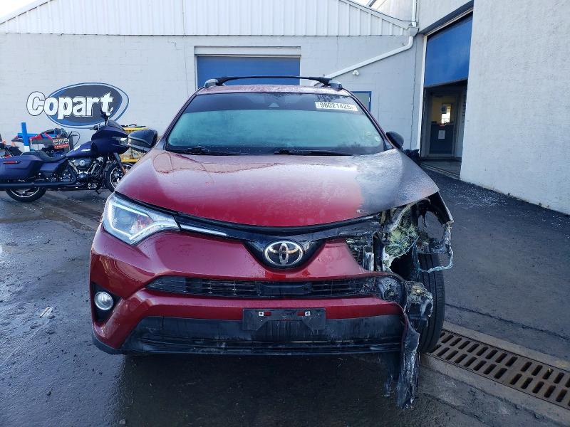 Photo 5 from auction – 2018 TOYOTA RAV4 LE with VIN 2T3BFREV6JW819625