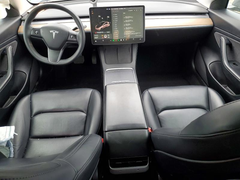 Снимка 8 от търг – 2021 TESLA MODEL 3 с VIN 5YJ3E1EB1MF858051