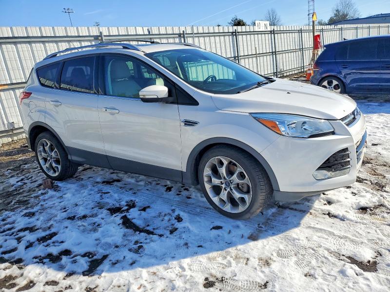 Photo 4 from auction – 2016 FORD ESCAPE TIT with VIN 1FMCU9JX3GUB31584