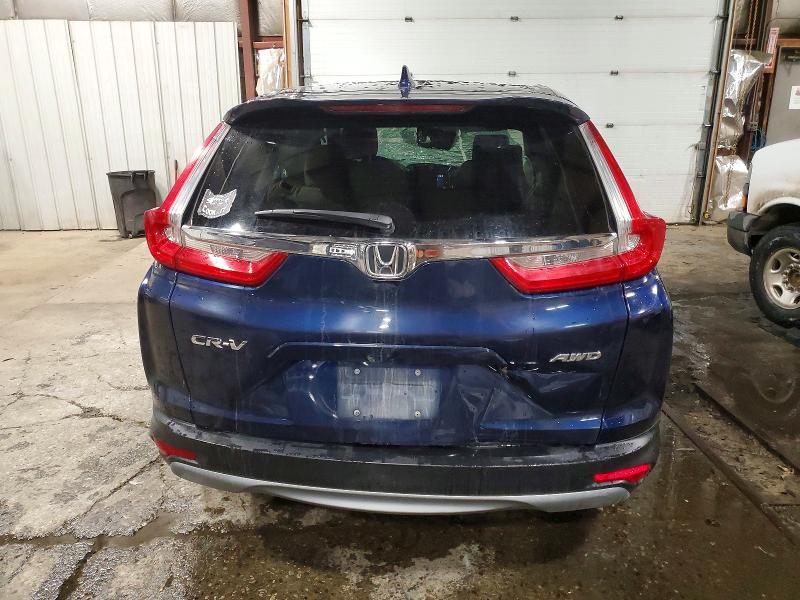 Photo 6 from auction – 2018 HONDA CR-V EX with VIN 2HKRW2H57JH661224