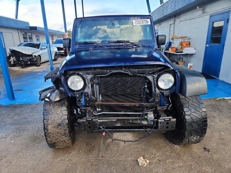 Photo 5 from auction – 2013 JEEP WRANGLER S with VIN 1C4AJWAG2DL605433