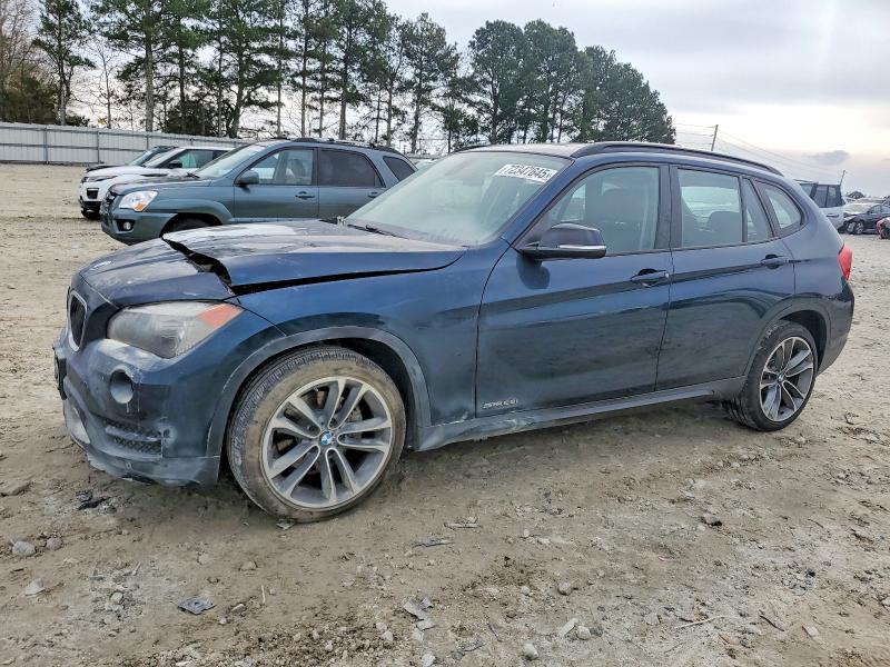 BMW X1 2015 with VIN WBAVM1C51FVW57017 - Photo from auction