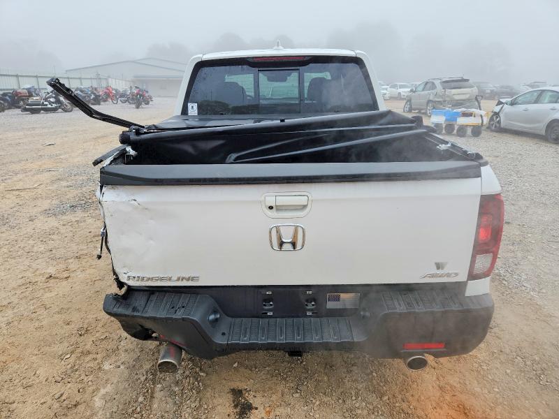 Photo 6 from auction – 2023 HONDA RIDGELINE with VIN 5FPYK3F52PB038334