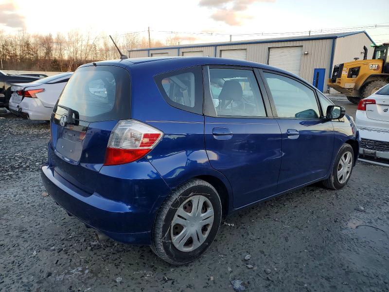 Photo 3 from auction – 2009 HONDA FIT with VIN JHMGE88259S070551