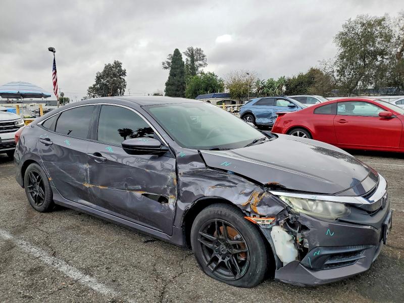 Photo 4 from auction – 2017 HONDA CIVIC LX with VIN 2HGFC2F5XHH528346