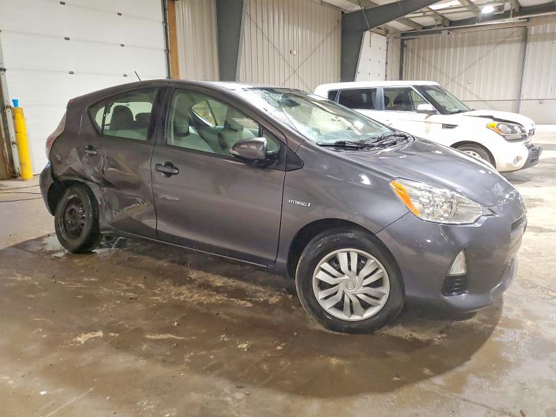Photo 4 from auction – 2014 TOYOTA PRIUS C with VIN JTDKDTB33E1072009