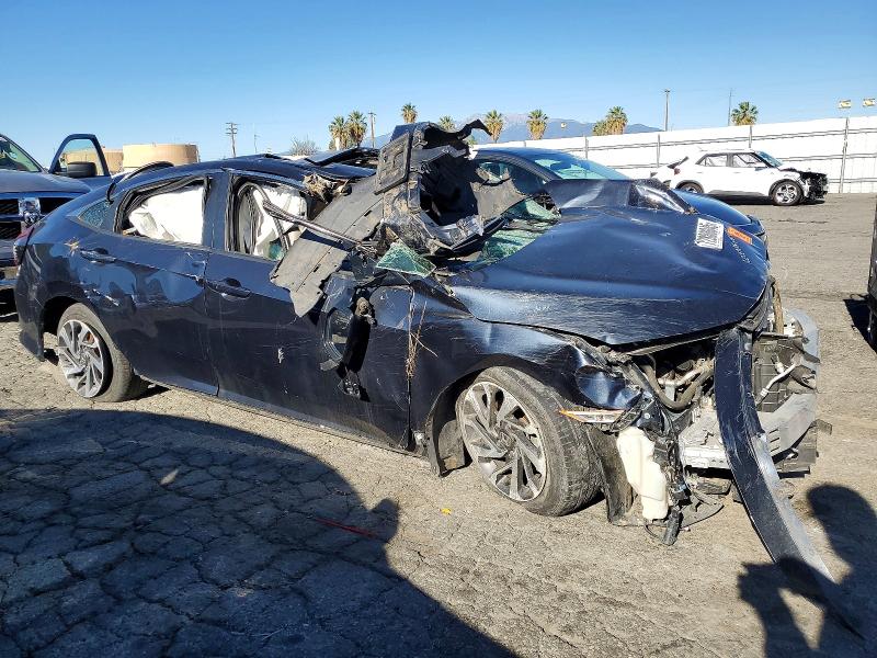 Photo 4 from auction – 2018 HONDA CIVIC with VIN 2HGFC2F70JH574548