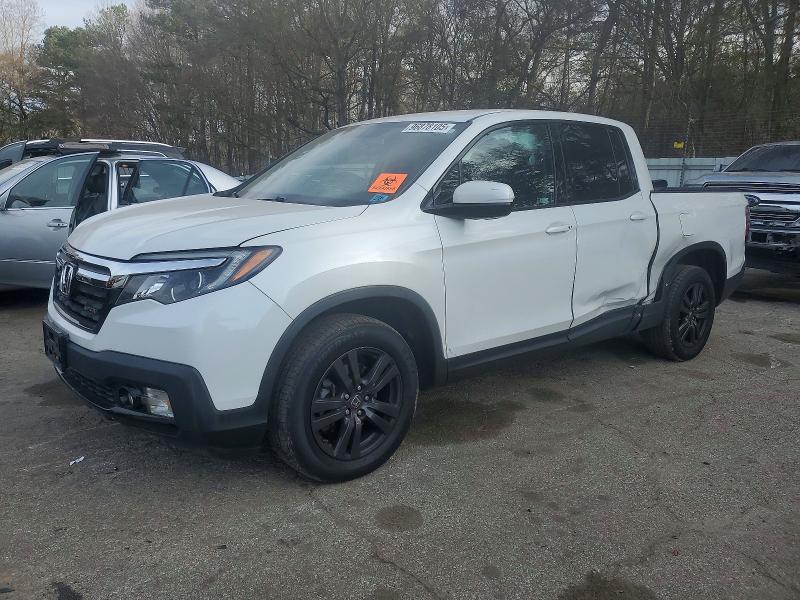 HONDA RIDGELINE 2019 with VIN 5FPYK3F14KB047557 - Photo from auction