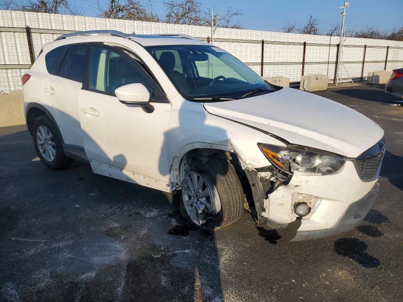 Photo 4 from auction – 2013 MAZDA CX-5 TOURI with VIN JM3KE2CE9D0148612