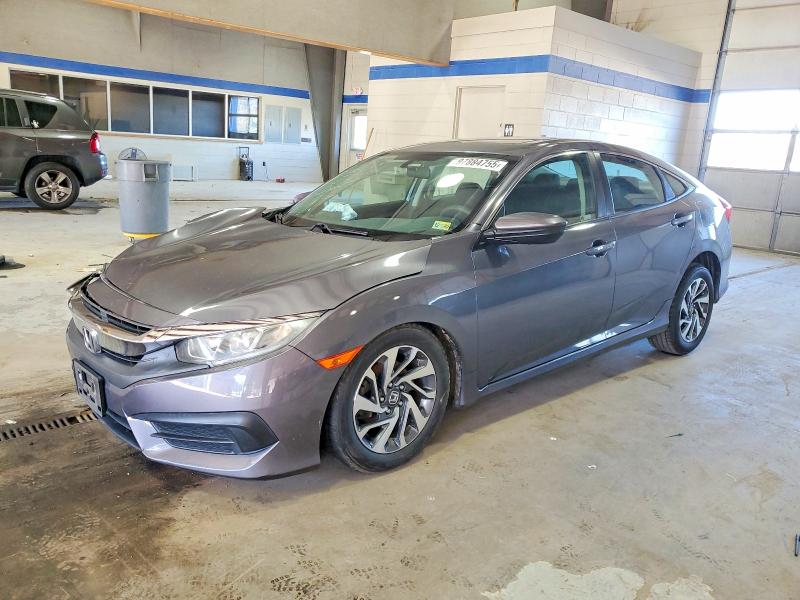 Photo 1 from auction – 2018 HONDA CIVIC EX with VIN 2HGFC2F73JH582675