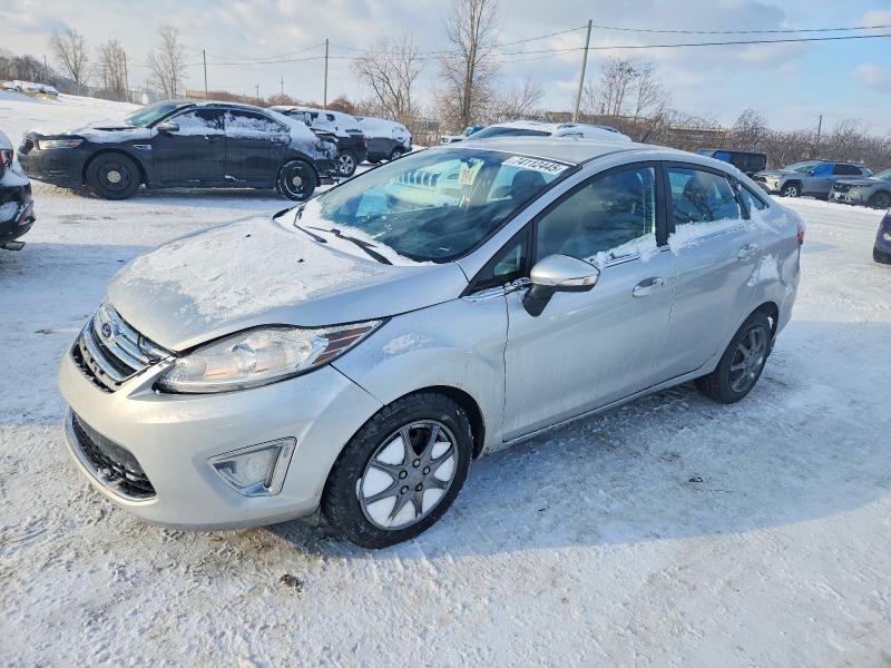FORD FIESTA 2013 with VIN 3FADP4CJ4DM206200 - Photo from auction