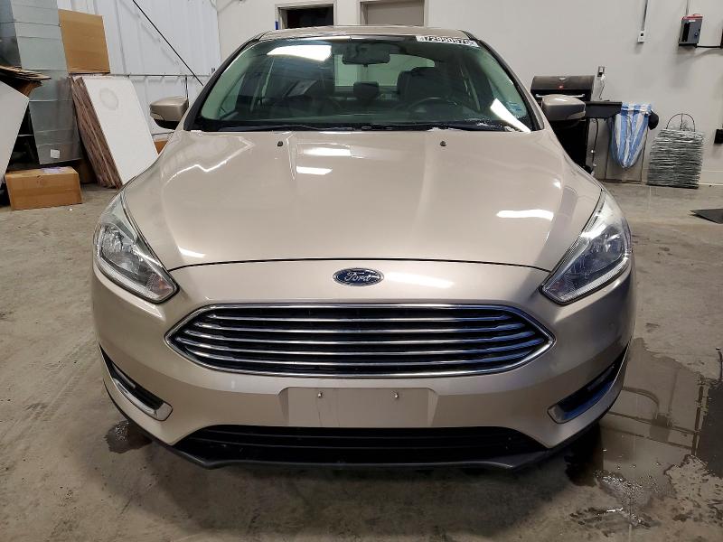 Photo 5 from auction – 2017 FORD FOCUS TITA with VIN 1FADP3J24HL310442