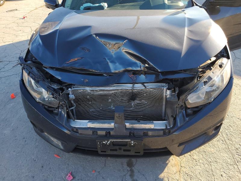 Photo 11 from auction – 2018 HONDA CIVIC with VIN 19XFC1F74JE002175