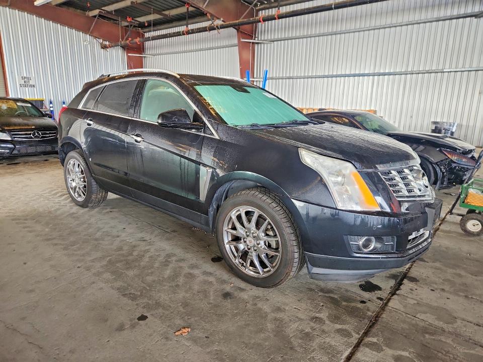 Photo 4 from auction – 2013 CADILLAC SRX PREMIU with VIN 3GYFNEE39DS624061