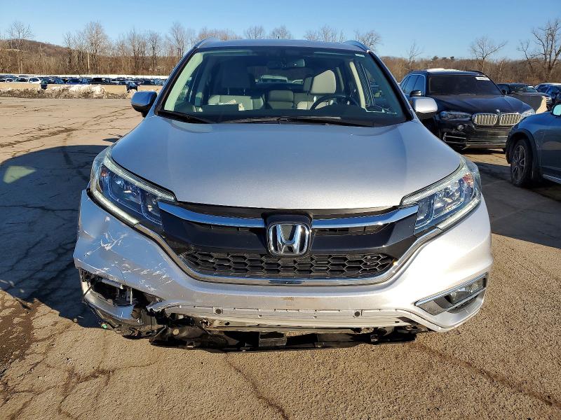 Photo 5 from auction – 2015 HONDA CR-V EXL with VIN 5J6RM4H75FL030553