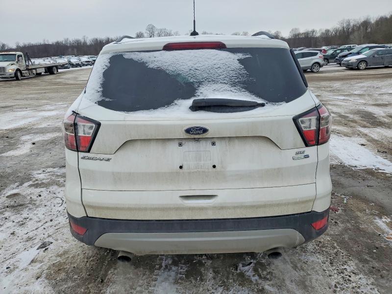 Photo 6 from auction – 2018 FORD ESCAPE with VIN 1FMCU9GD7JUA58045