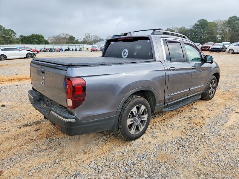 Photo 3 from auction – 2017 HONDA RIDGELINE with VIN 5FPYK2F62HB009274
