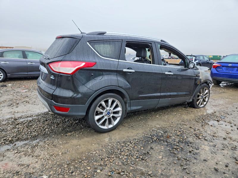 Photo 3 from auction – 2014 FORD ESCAPE SE with VIN 1FMCU9GX0EUC49841