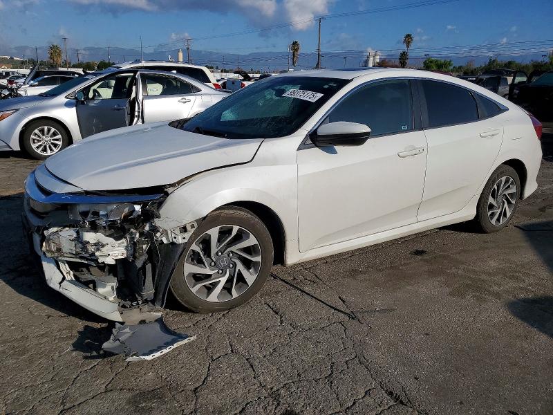 HONDA CIVIC EX 2017 with VIN 2HGFC2F78HH534129 - Photo from auction