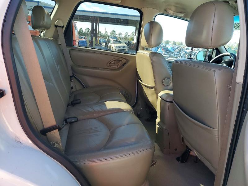 Photo 11 from auction – 2003 MAZDA TRIBUTE ES with VIN 4F2CZ06123KM27739