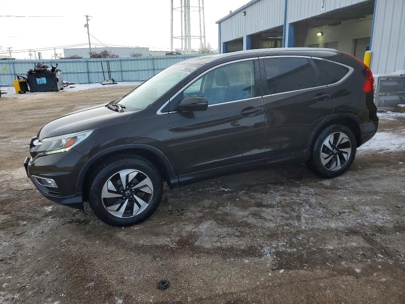HONDA CR-V TOURI 2016 with VIN 5J6RM4H93GL101624 - Photo from auction