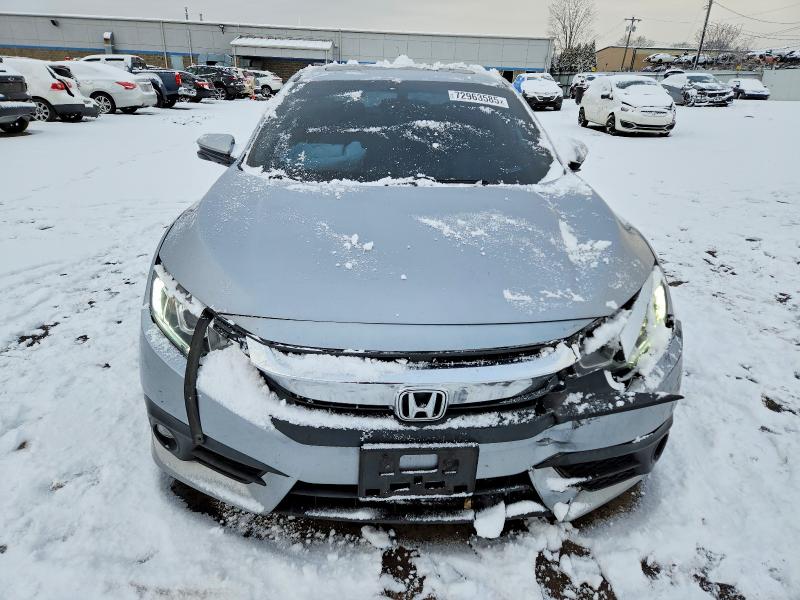 Photo 5 from auction – 2017 HONDA CIVIC with VIN 2HGFC1F75HH657509