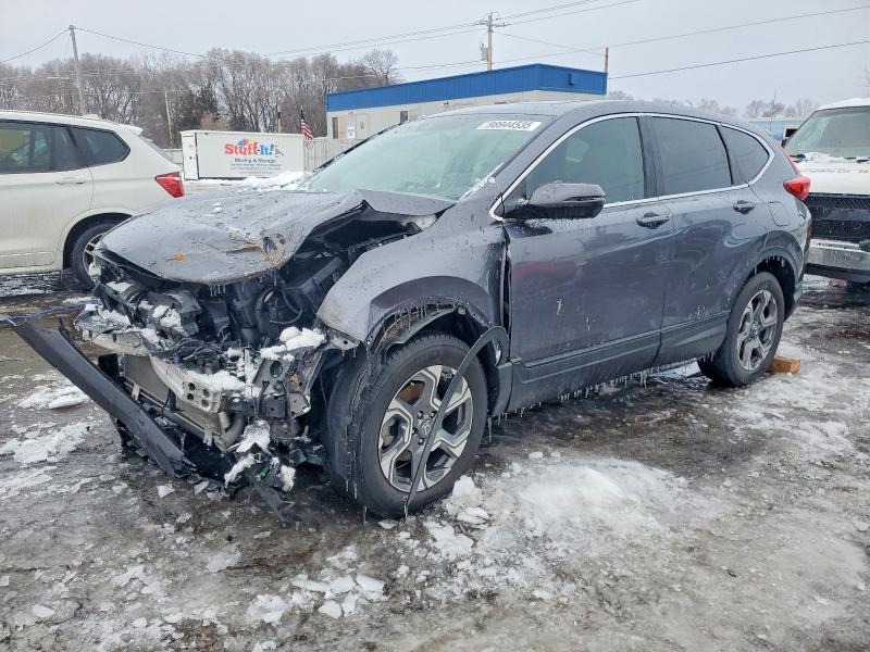 Photo 1 from auction – 2017 HONDA CR-V with VIN 5J6RW2H81HL023643