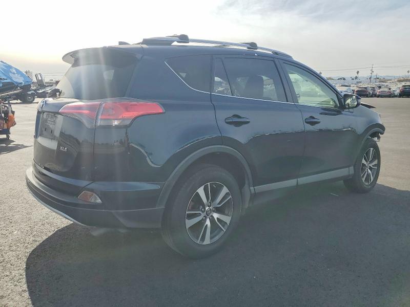 Photo 3 from auction – 2017 TOYOTA RAV4 with VIN JTMWFREV5HJ714620