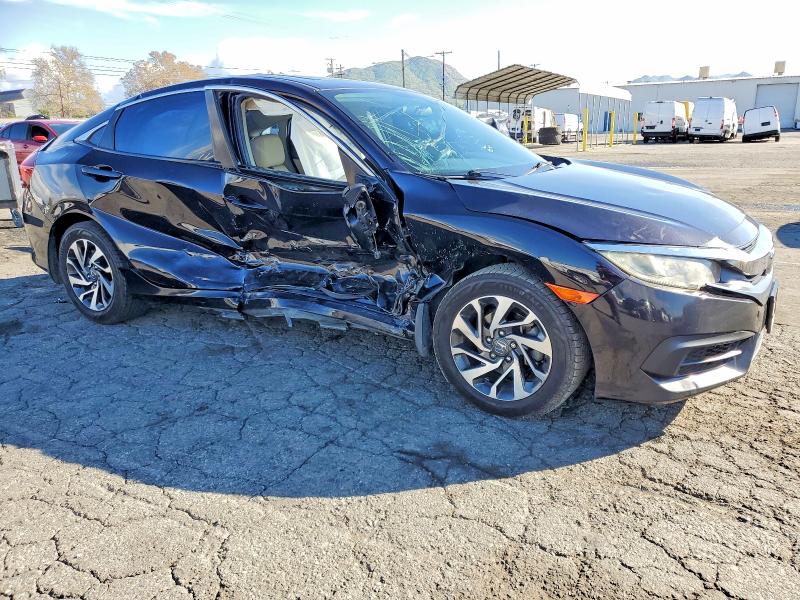 Photo 4 from auction – 2016 HONDA CIVIC EX with VIN 2HGFC2F78GH559482