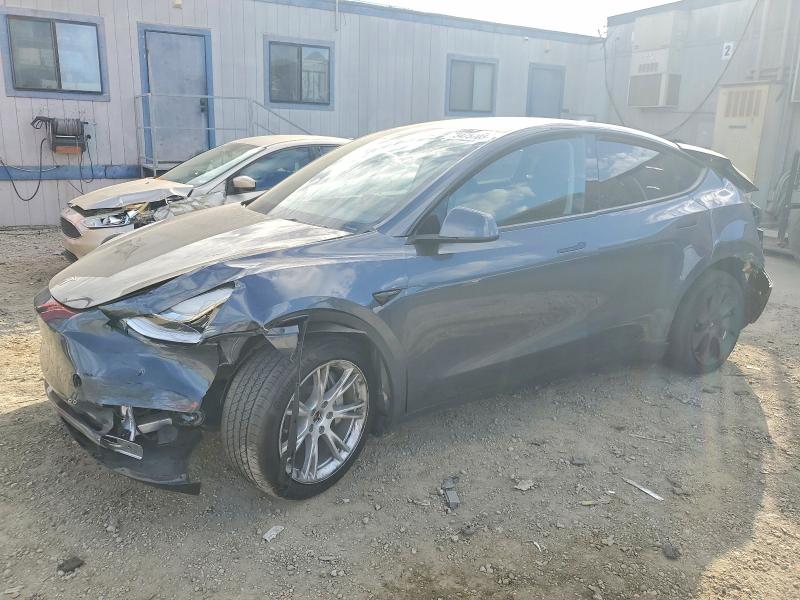 TESLA MODEL Y 2023 z numerem VIN 7SAYGDEE1PA054249 - Zdjęcie z aukcji