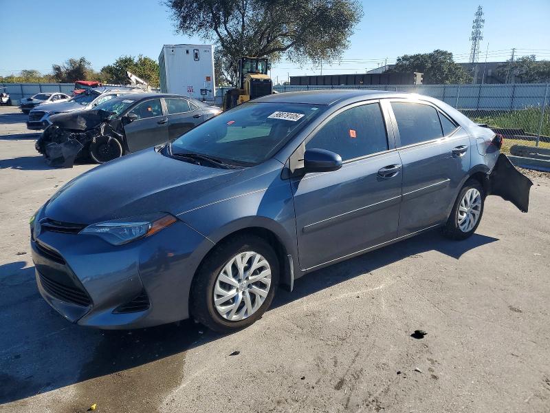 TOYOTA COROLLA L 2018 with VIN 5YFBURHE6JP844293 - Photo from auction