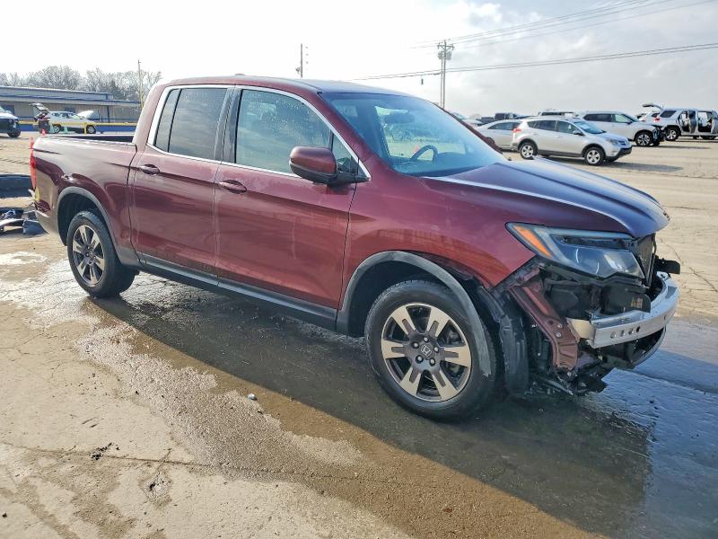 Photo 4 from auction – 2017 HONDA RIDGELINE with VIN 5FPYK2F59HB011594