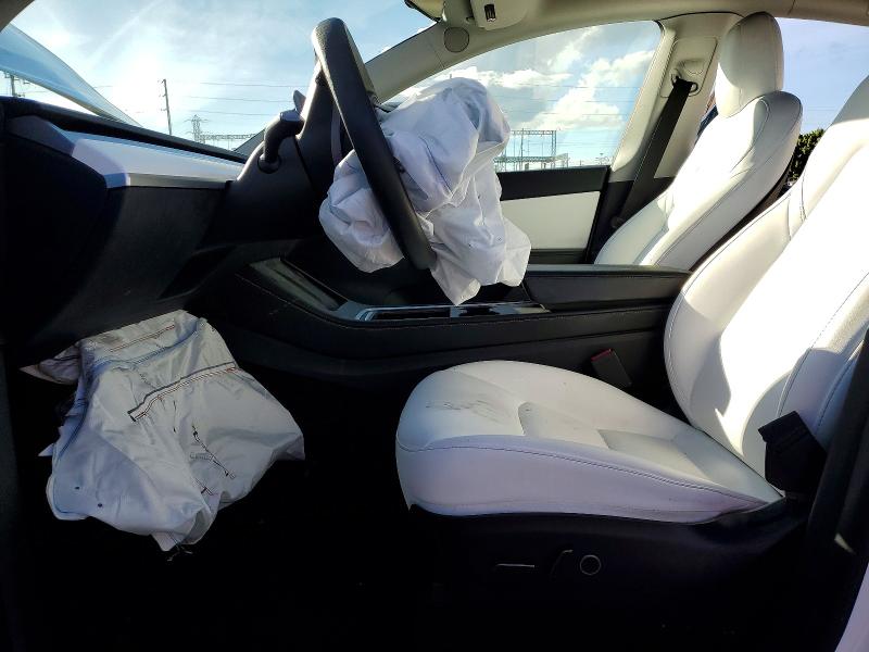 Photo 7 from auction – 2021 TESLA MODEL Y with VIN 5YJYGAEE8MF212709