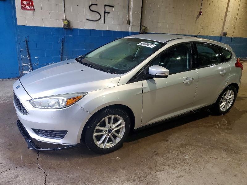 FORD FOCUS 2015 with VIN 1FADP3K2XFL284053 - Photo from auction