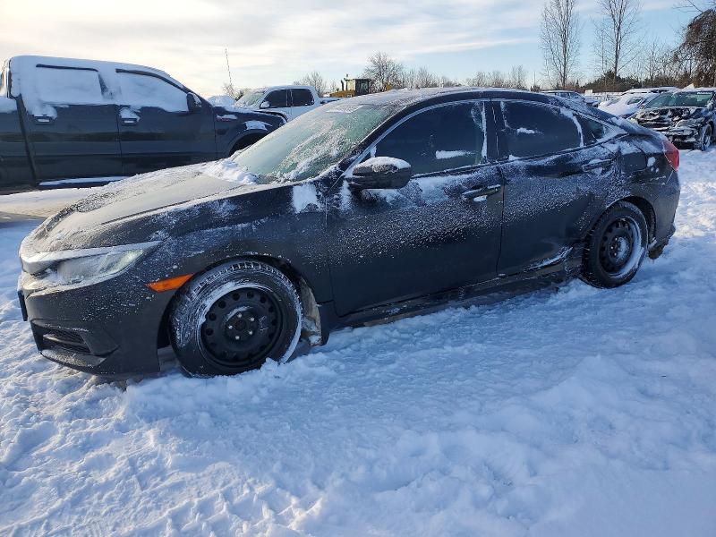 HONDA CIVIC LX 2016 with VIN 2HGFC2F59GH006256 - Photo from auction