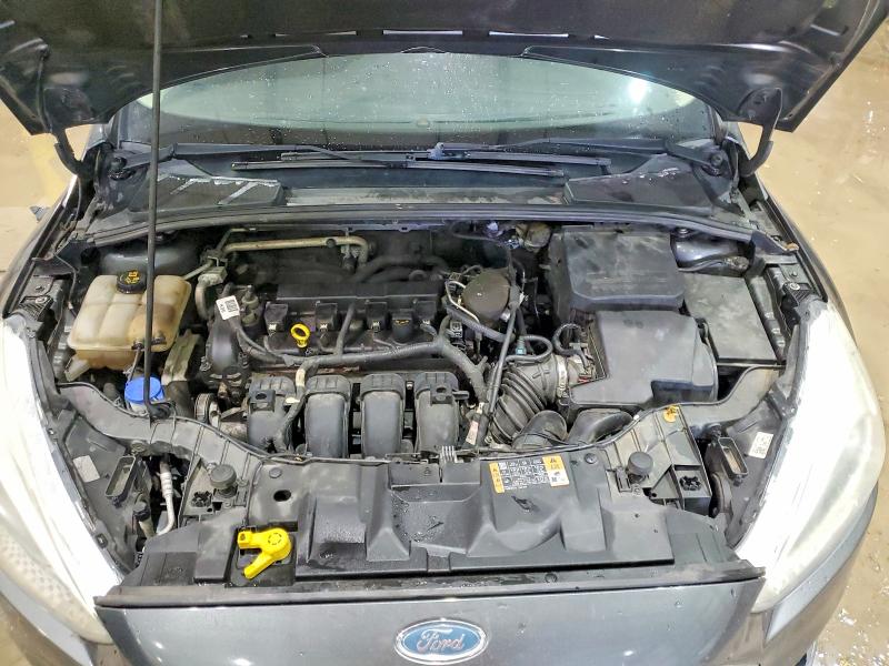 Photo 11 from auction – 2015 FORD FOCUS SE with VIN 1FADP3F21FL260623