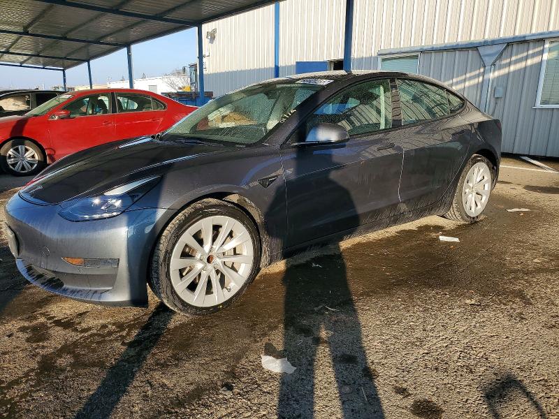 TESLA MODEL 3 2022 with VIN 5YJ3E1EA9NF287806 - Photo from auction