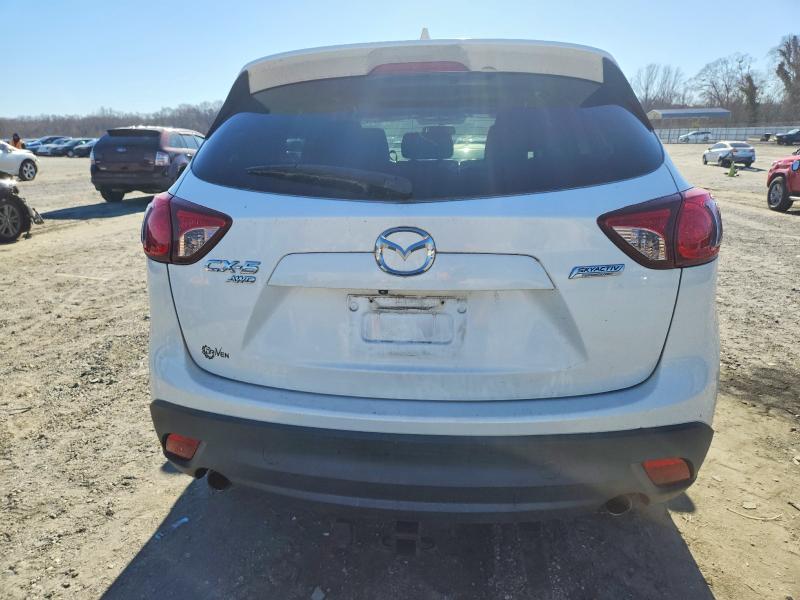 Photo 6 from auction – 2013 MAZDA CX-5 TOURI with VIN JM3KE4CE3D0109235