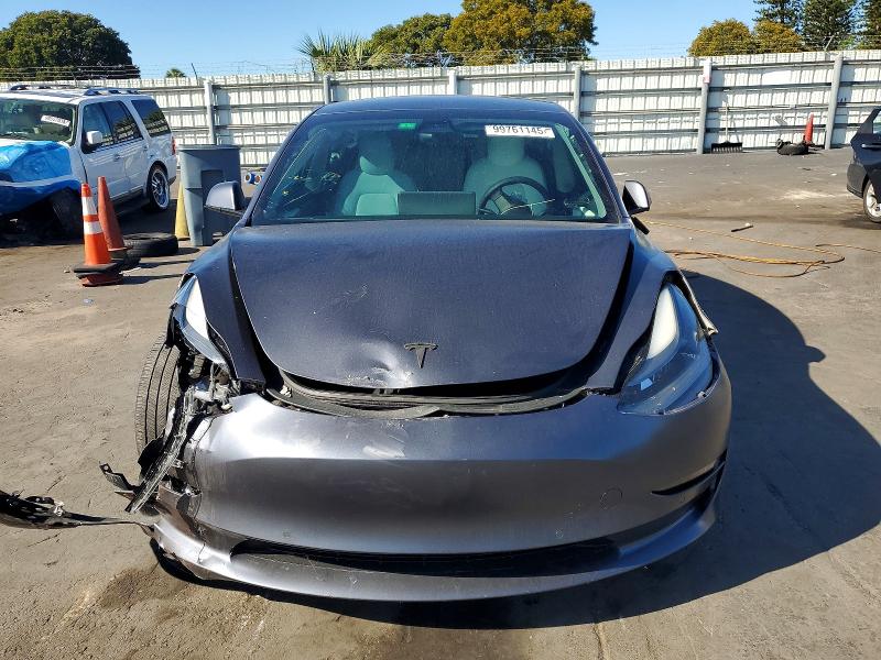 Photo 5 from auction – 2022 TESLA MODEL 3 with VIN 5YJ3E1EB8NF102315