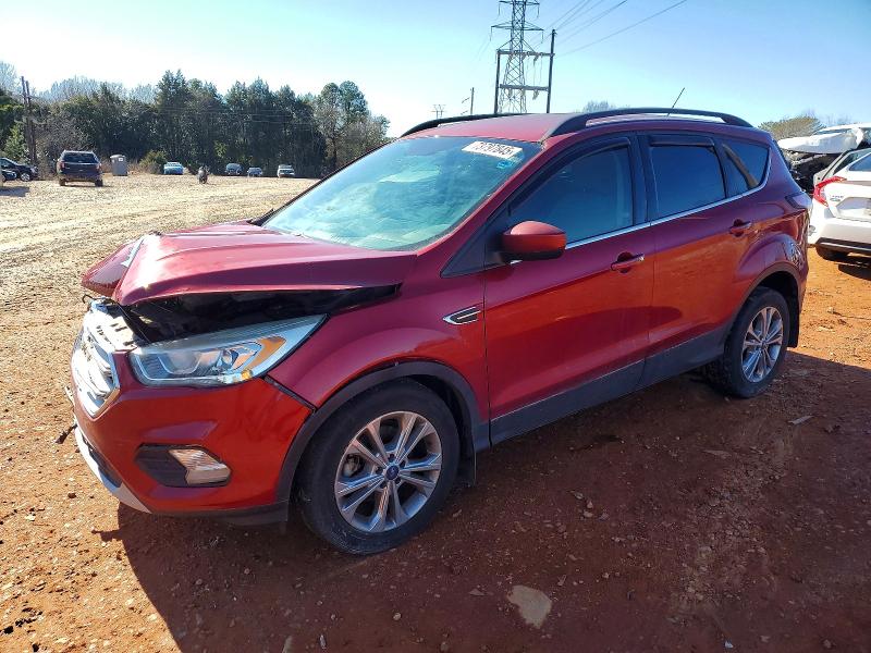 FORD ESCAPE 2017 with VIN 1FMCU0GD3HUE51529 - Photo from auction