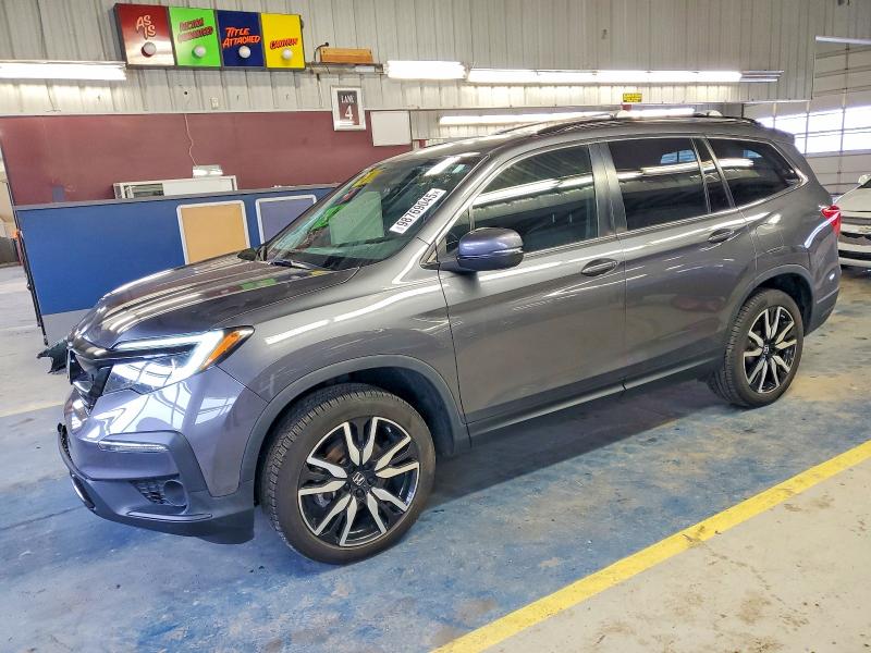 HONDA PILOT SE 2021 with VIN 5FNYF6H26MB043582 - Photo from auction