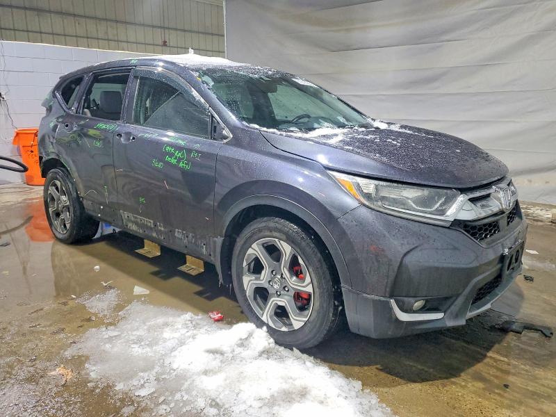 Photo 4 from auction – 2017 HONDA CR-V EXL with VIN 5J6RW2H86HL007079