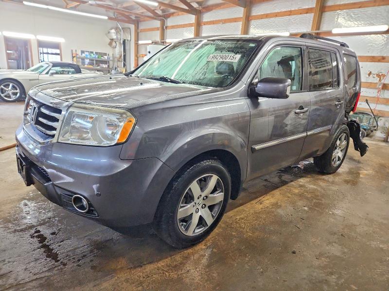 HONDA PILOT TOUR 2015 with VIN 5FNYF4H96FB033557 - Photo from auction