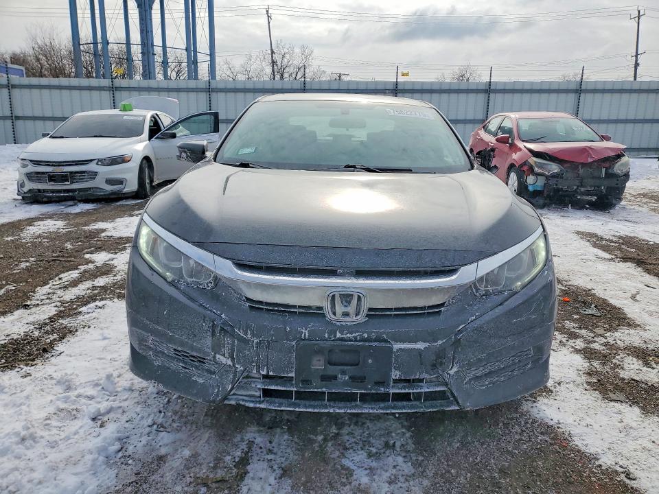 Photo 5 from auction – 2018 HONDA CIVIC EX with VIN 19XFC2F72JE038890