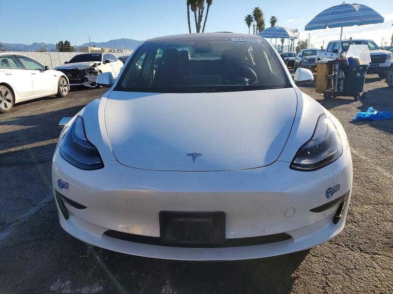 Photo 5 from auction – 2021 TESLA MODEL 3 with VIN 5YJ3E1EB6MF003314