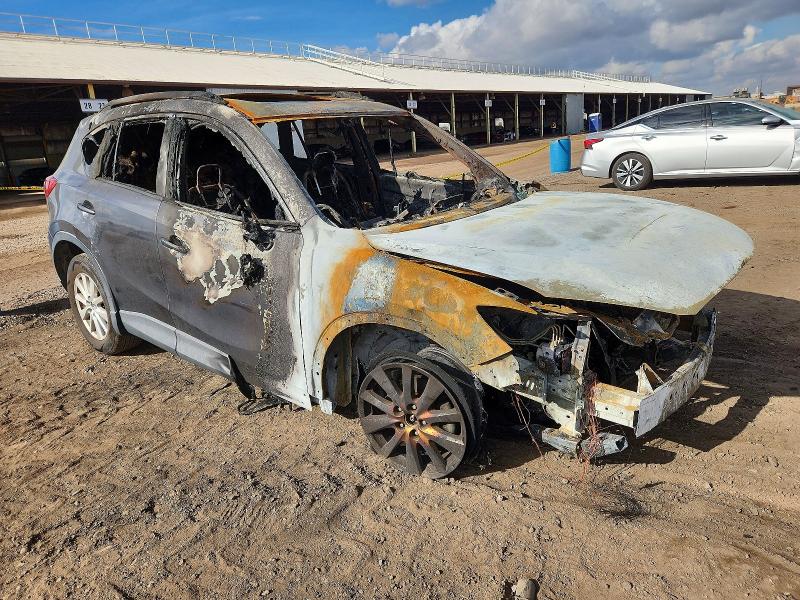 Photo 4 from auction – 2014 MAZDA CX-5 TOURI with VIN JM3KE2CY8E0369095