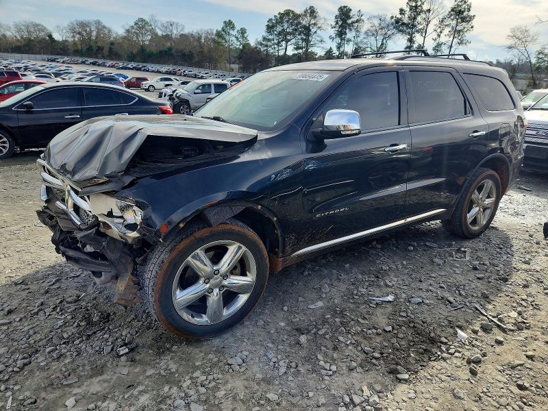 DODGE DURANGO 2013 with VIN 1C4RDHEG3DC617302 - Photo from auction