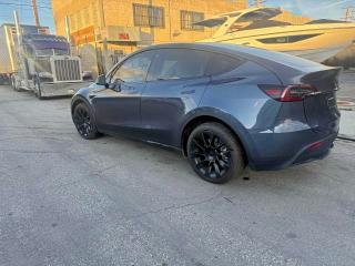 Photo 3 from auction – 2023 TESLA MODEL Y with VIN 7SAYGDEE2PA130691